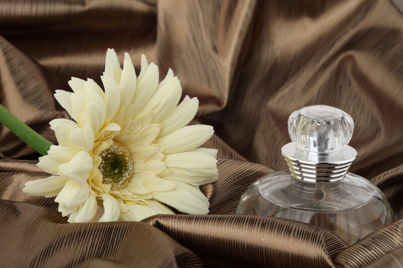 White Flower and Perfume Bottle