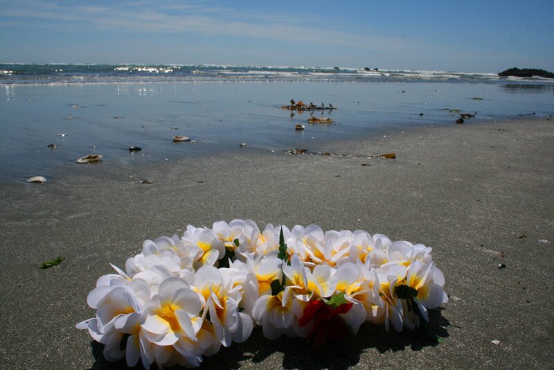 White Flower Lei on Beach