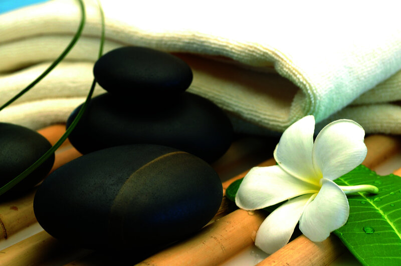 White Flower with Black Stones — Serene