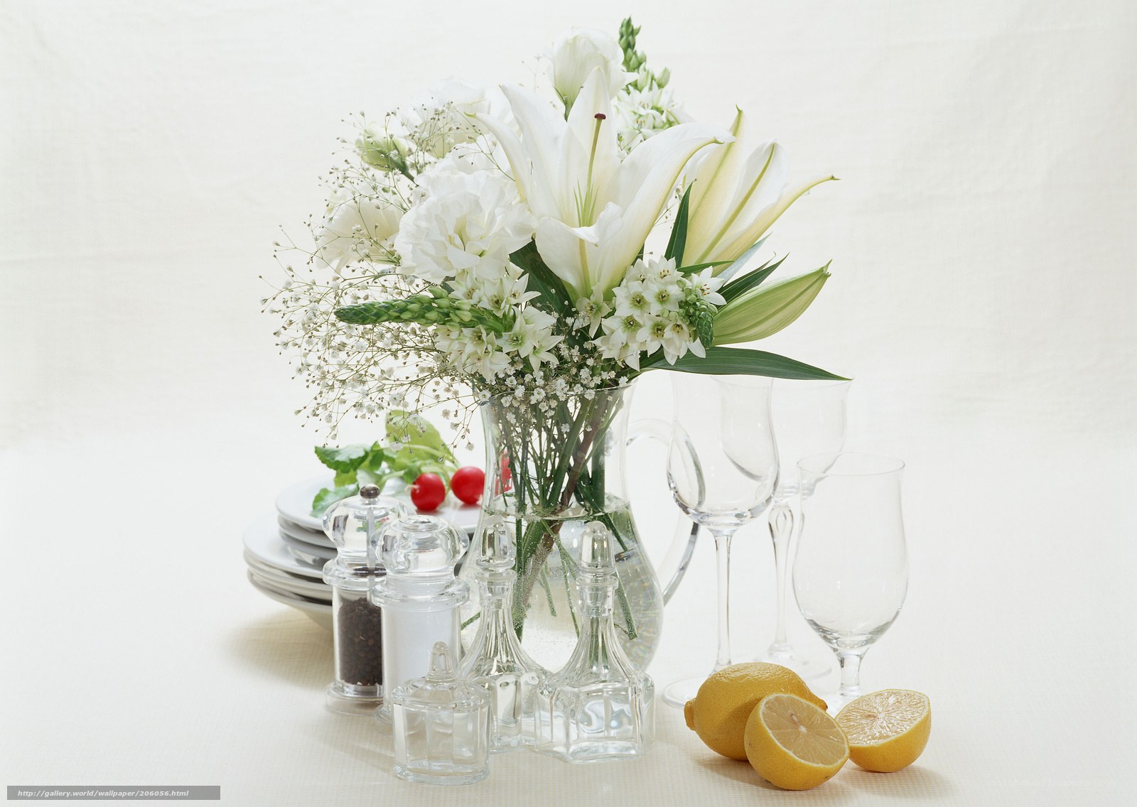 White flowers and lemons on table