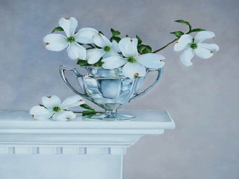 White flowers in a silver vase