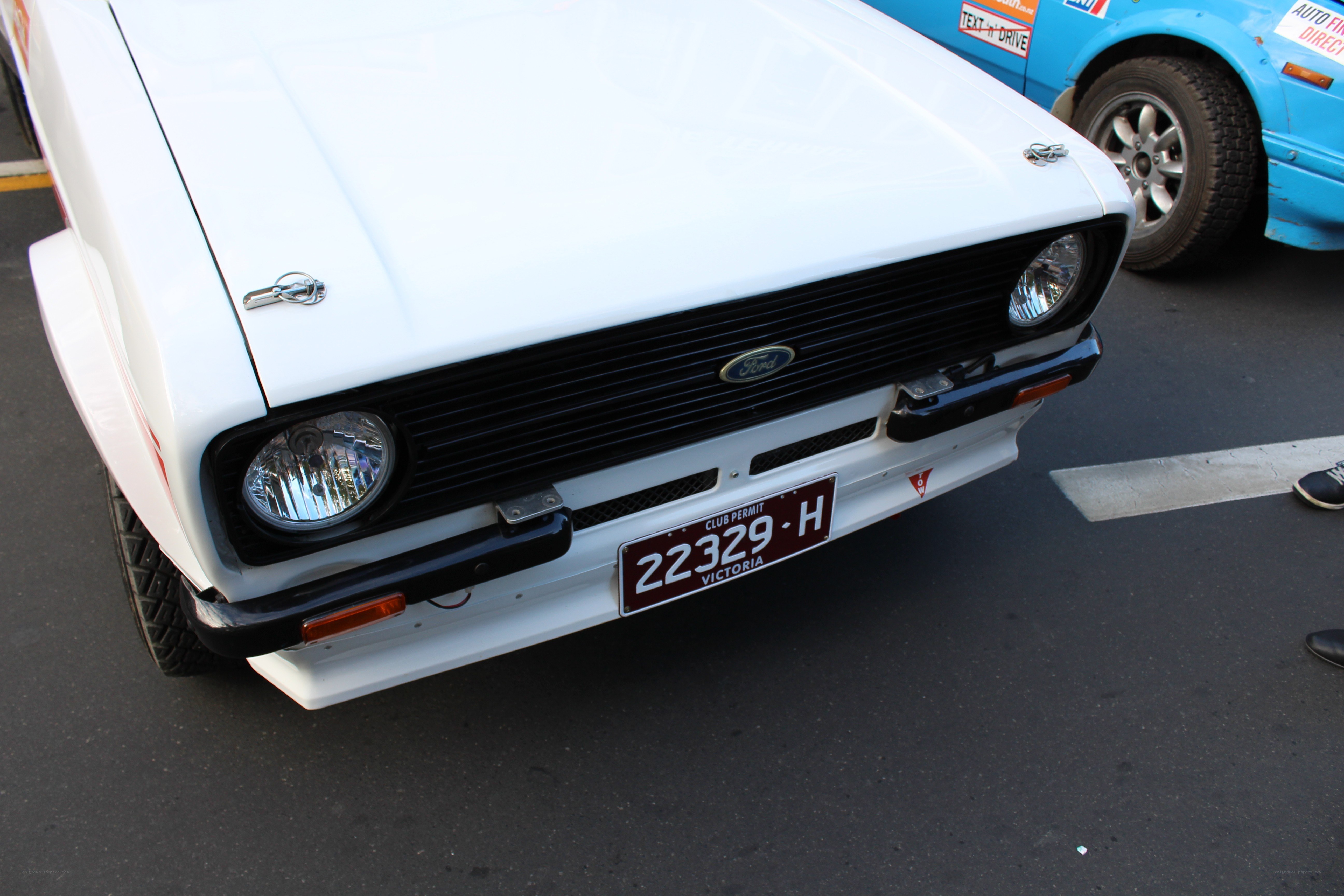 White Ford Escort front view