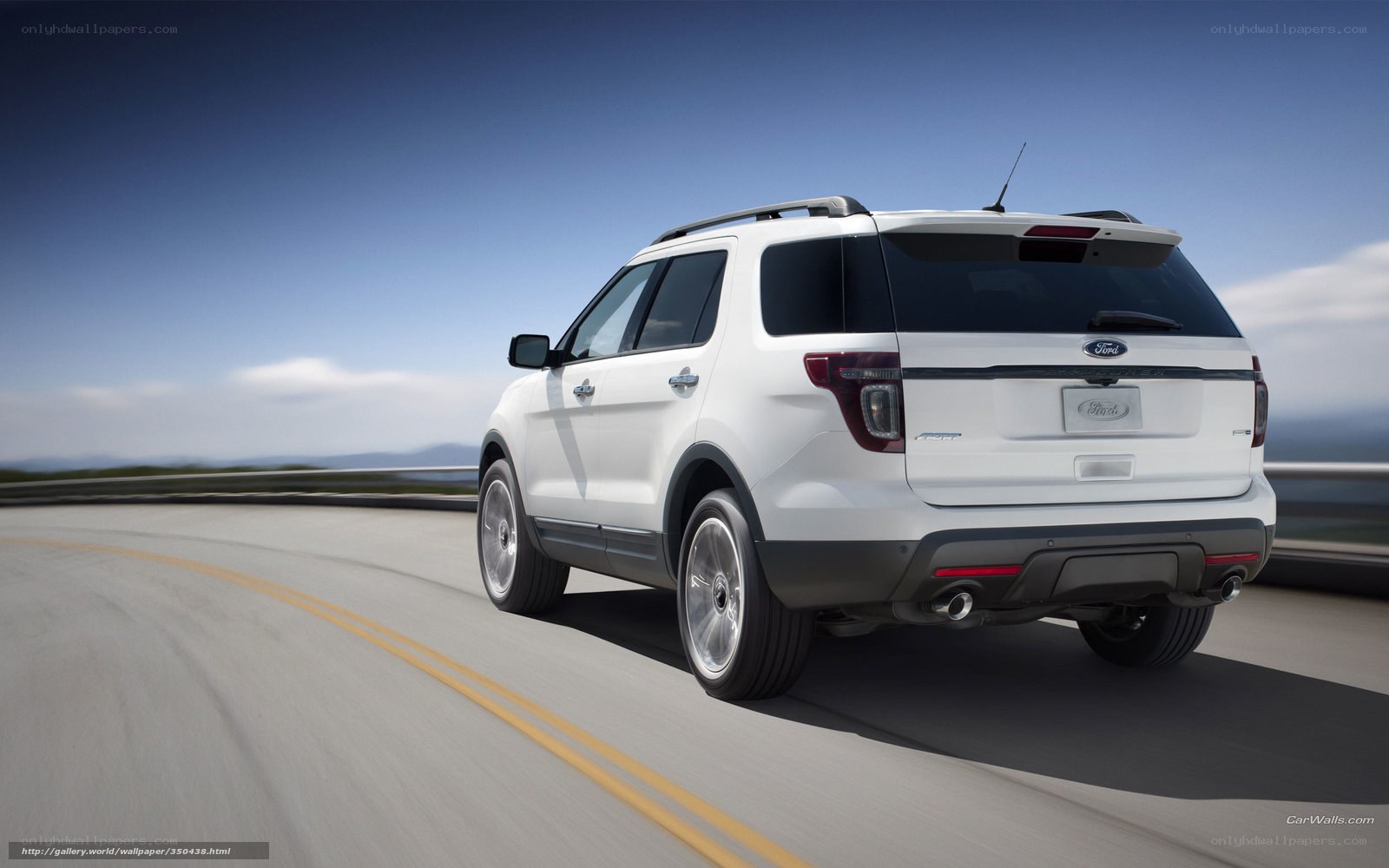 white ford explorer driving