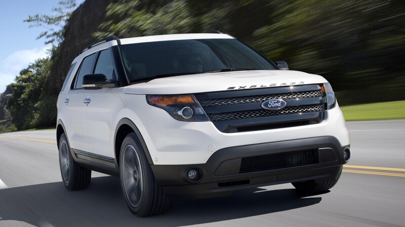 White Ford Explorer on a road