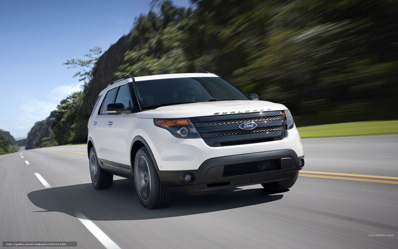 White Ford Explorer on a road