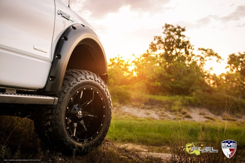 White Ford F-150 at sunset