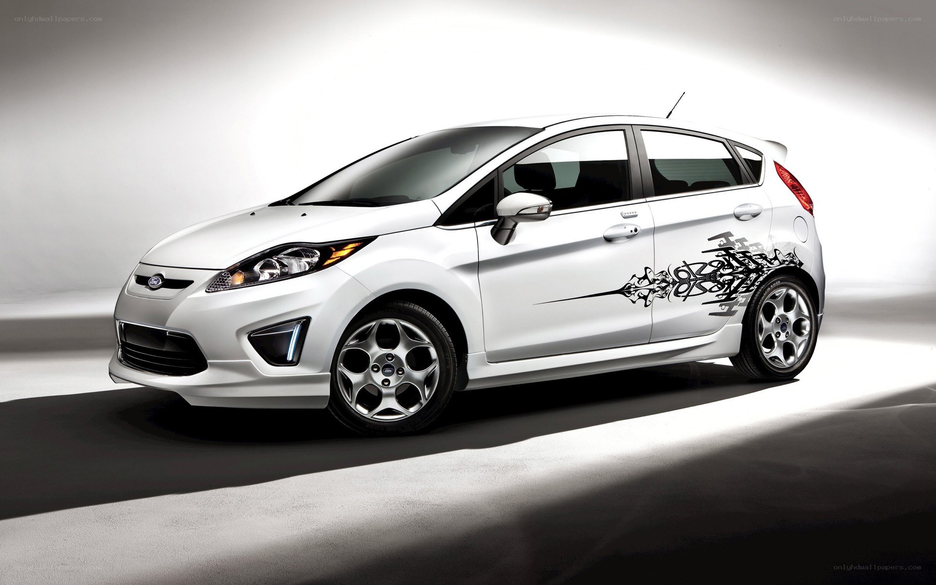 white ford fiesta hatchback