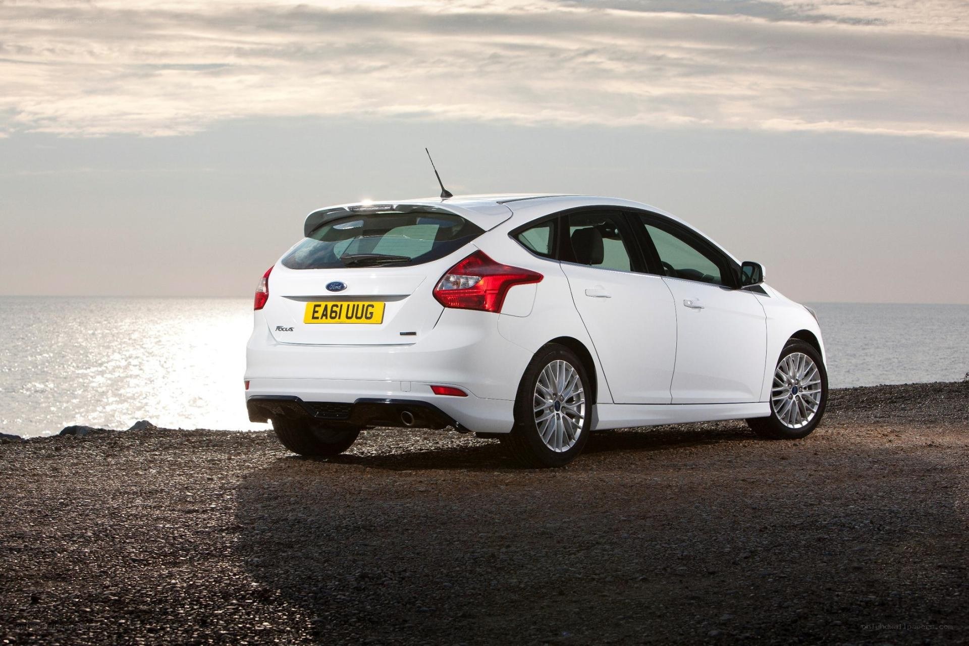 White Ford Focus by the sea
