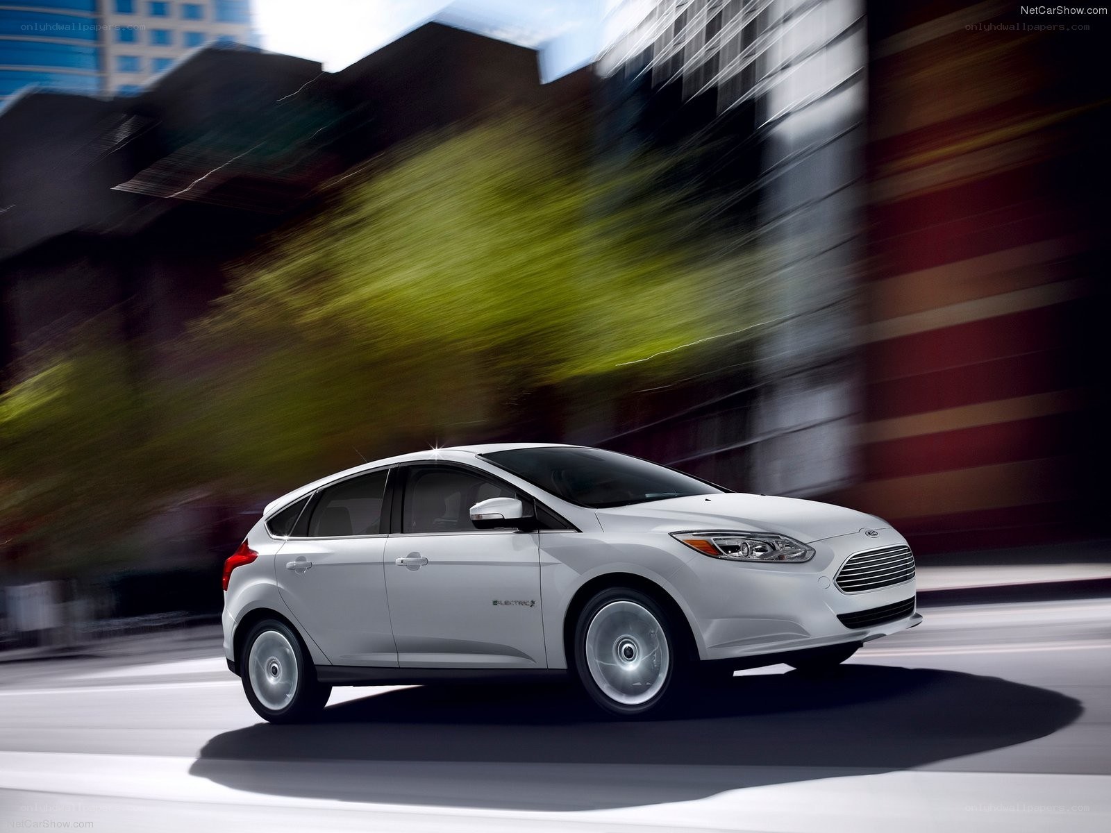 White Ford Focus Electric in motion