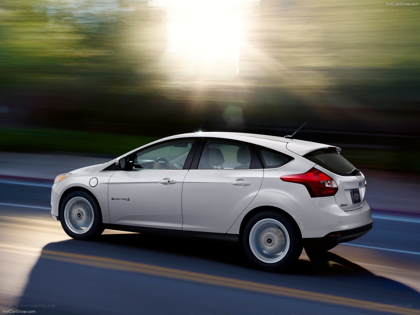 White Ford Focus Electric in motion