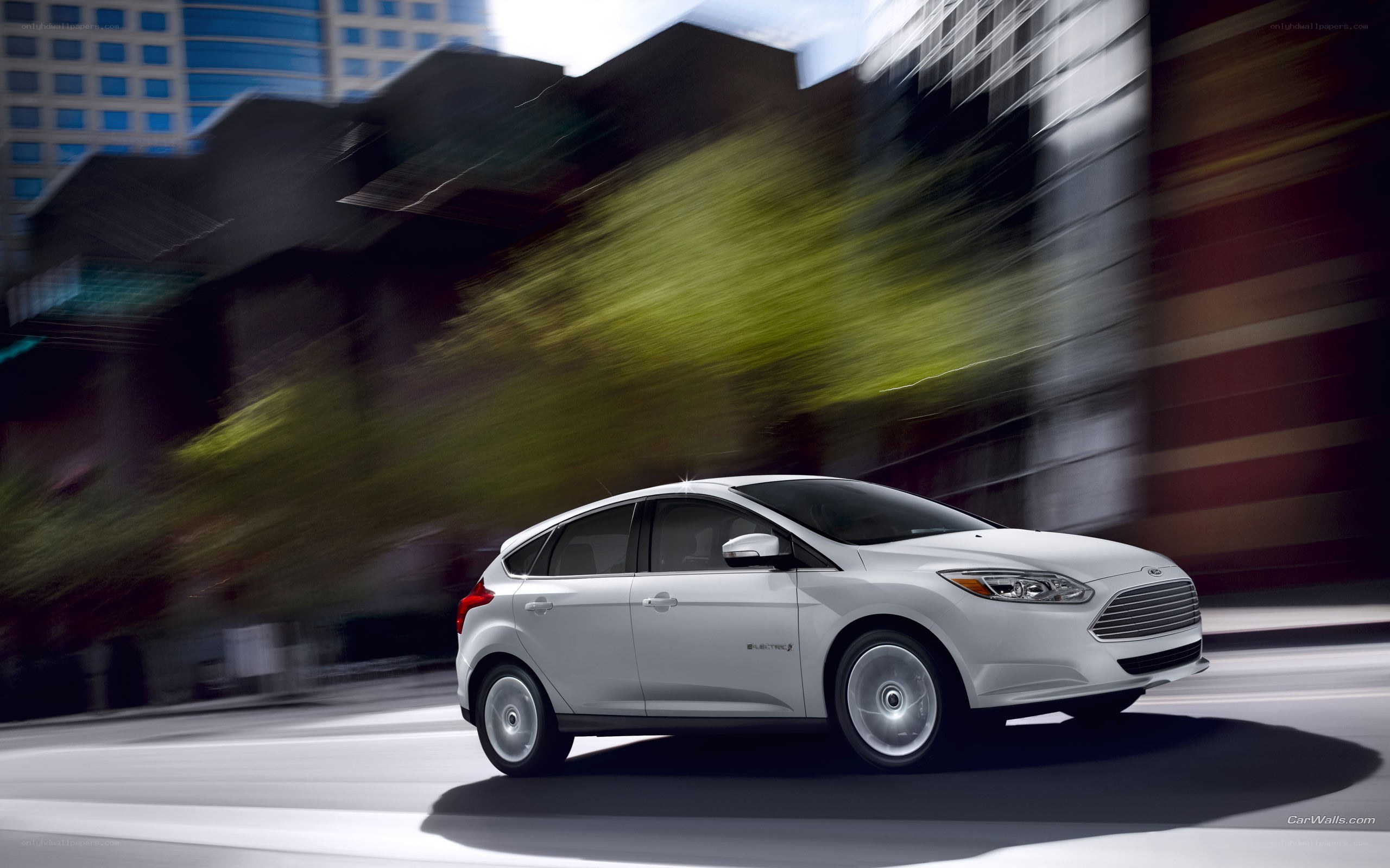 White Ford Focus Electric in motion