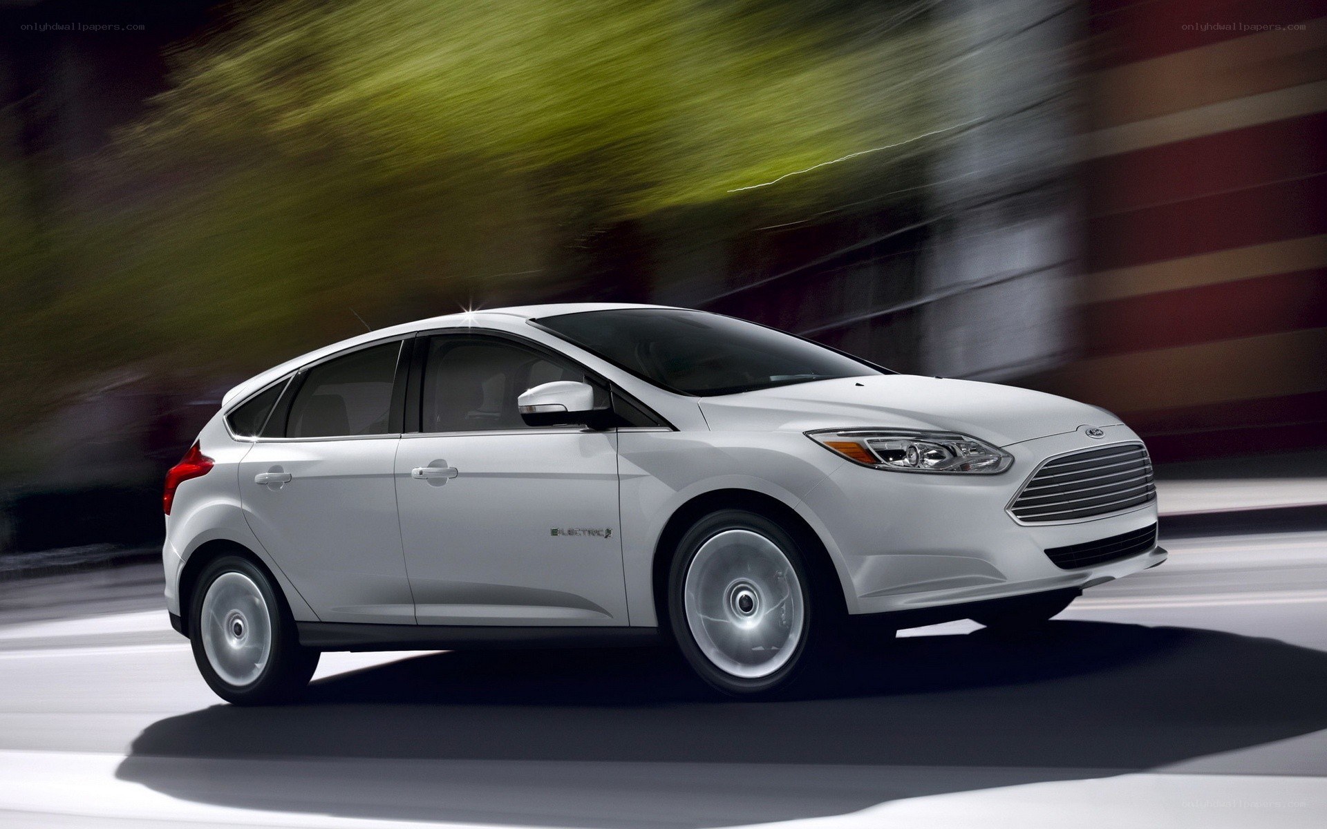 White Ford Focus Electric in motion