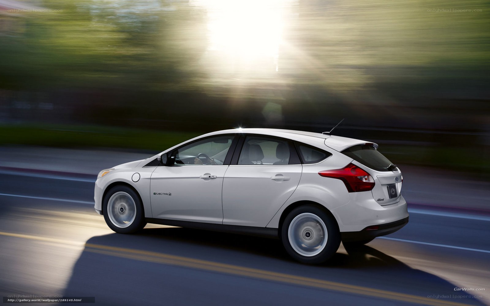 White Ford Focus Electric in motion