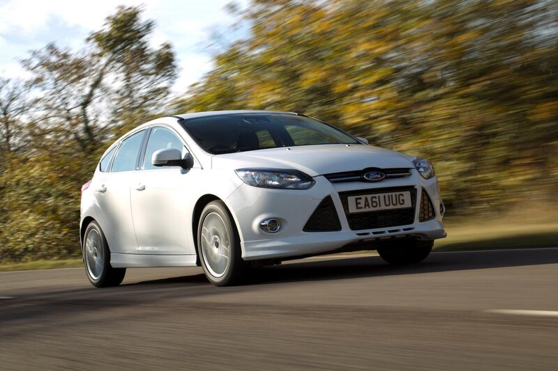 White Ford Focus in motion
