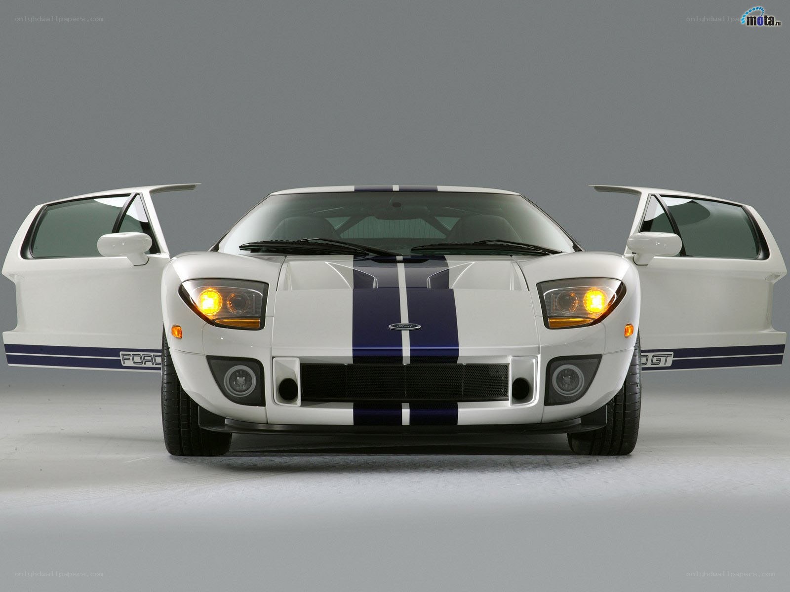 white ford gt with blue stripes