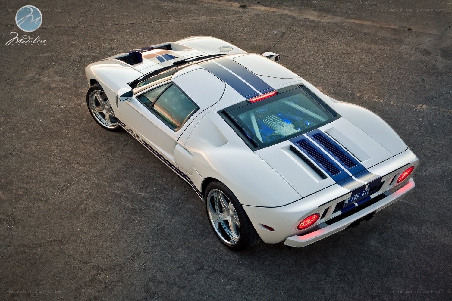 White Ford GT with blue stripes