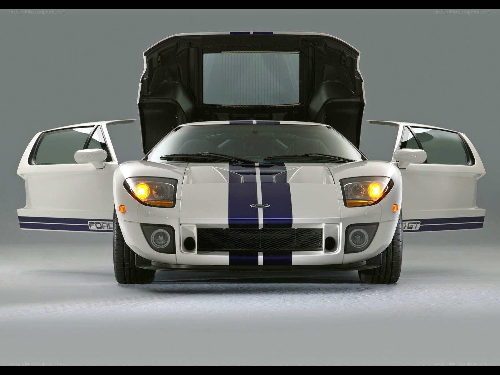 White Ford GT with open doors