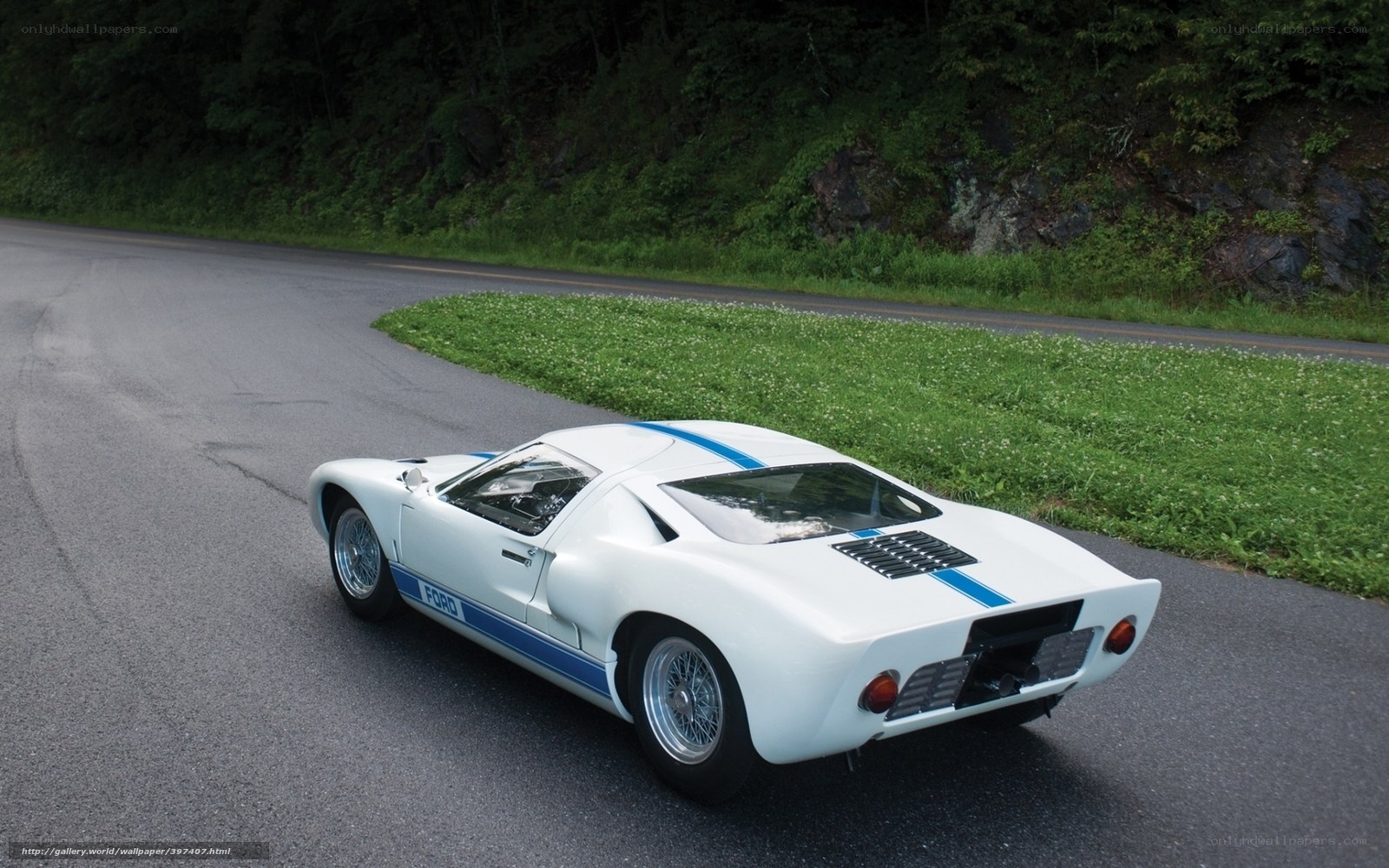 White Ford GT40 on a winding road