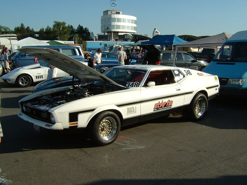White Ford Mustang at car show