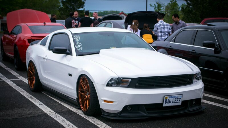 White Ford Mustang at car show