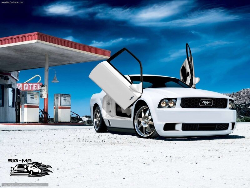White Ford Mustang at gas station