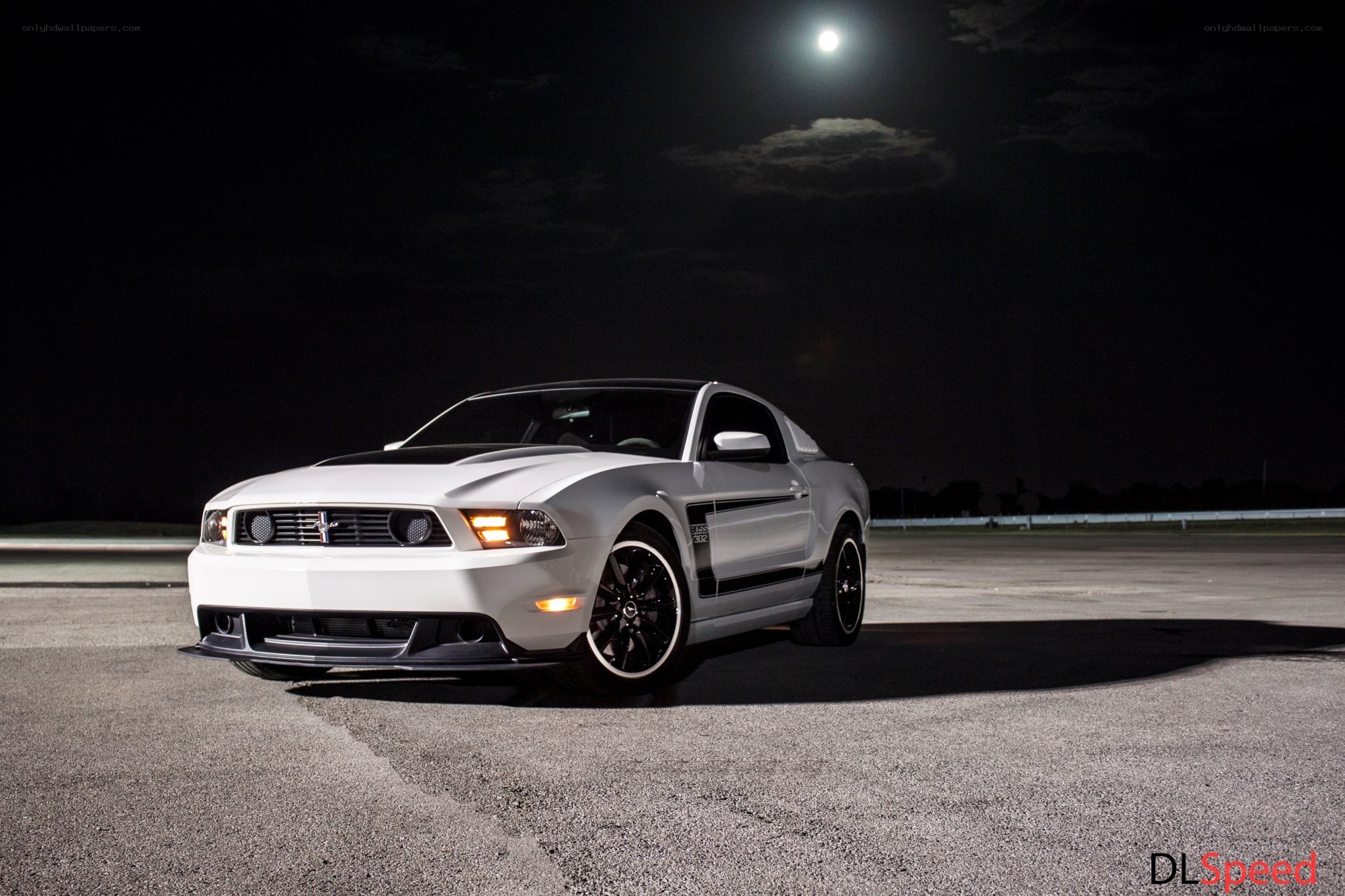 White Ford Mustang at night