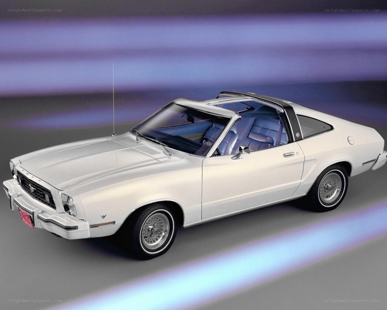 White Ford Mustang convertible