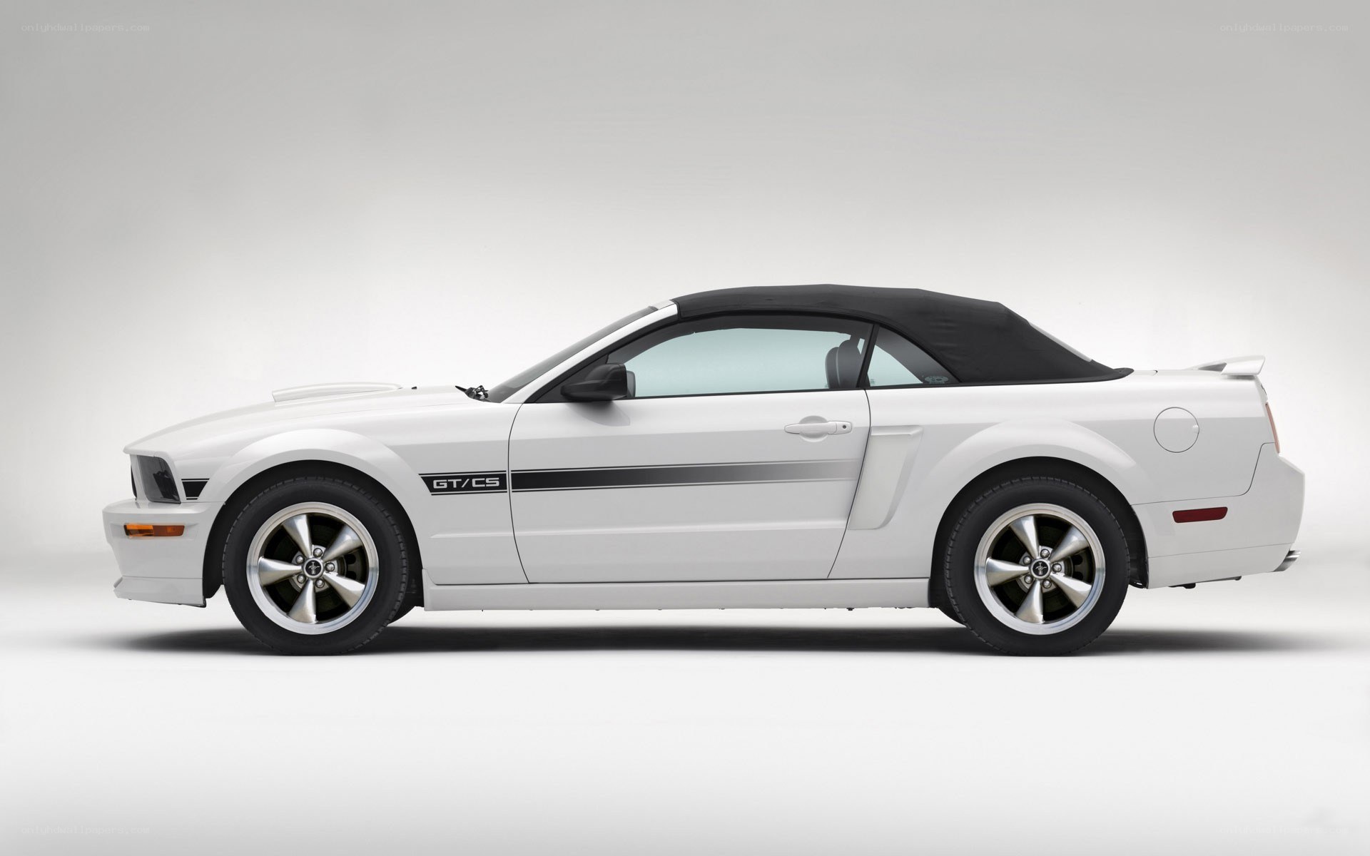 white ford mustang convertible