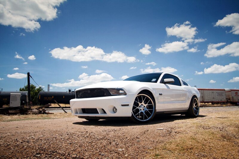 White Ford Mustang — Dramatic, Afternoon, Photograph, Train Cars, Gravel