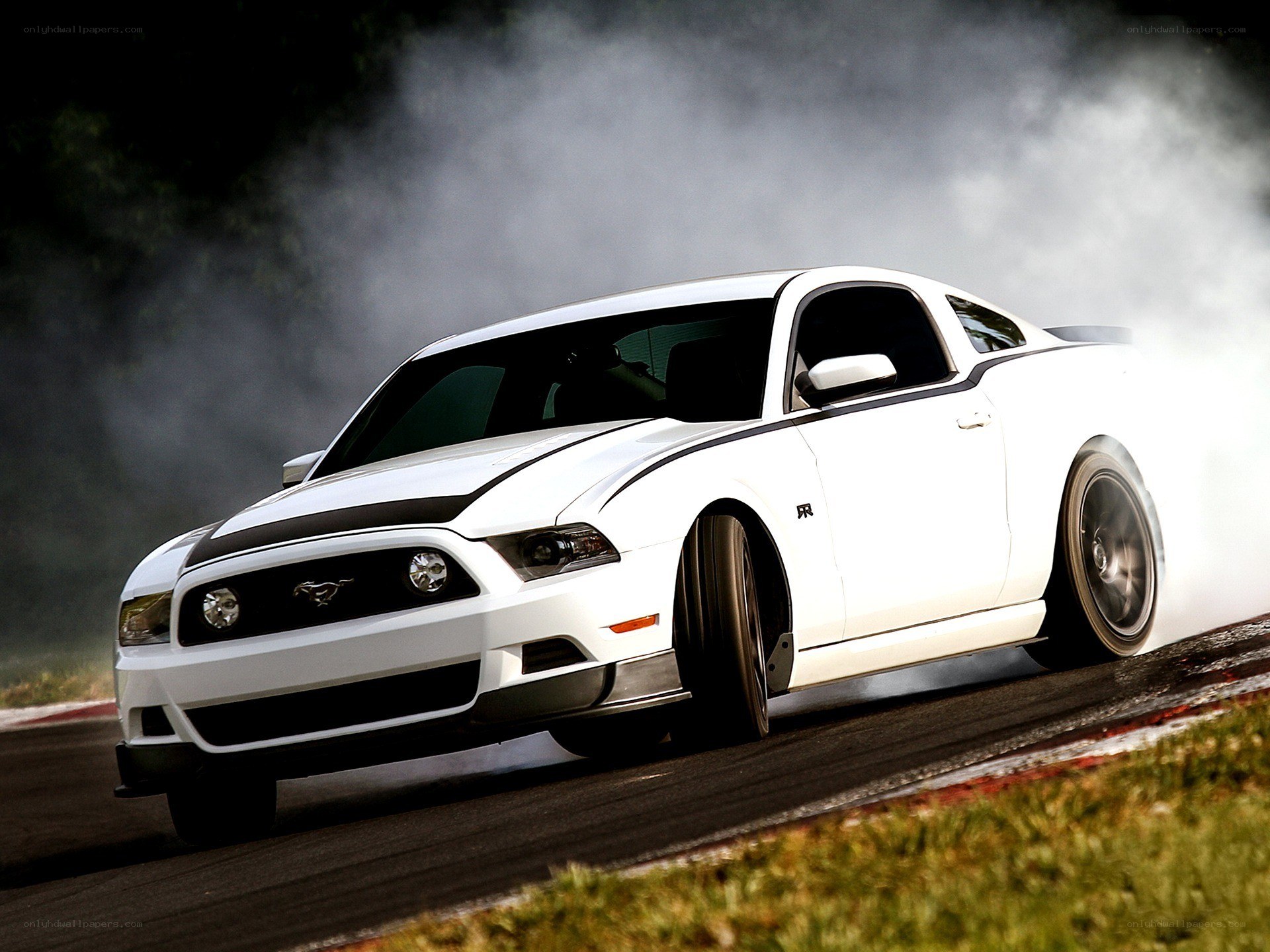 White Ford Mustang drifting