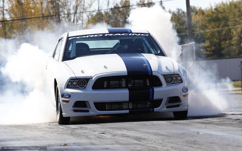 White Ford Mustang drifting