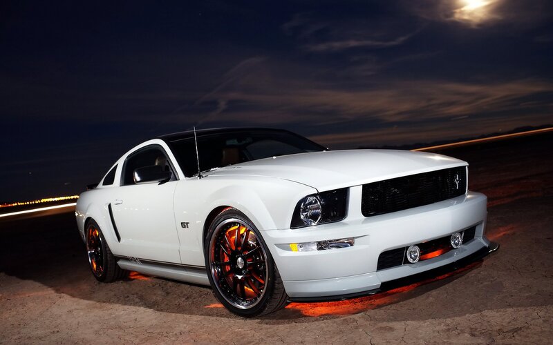 White Ford Mustang GT at night