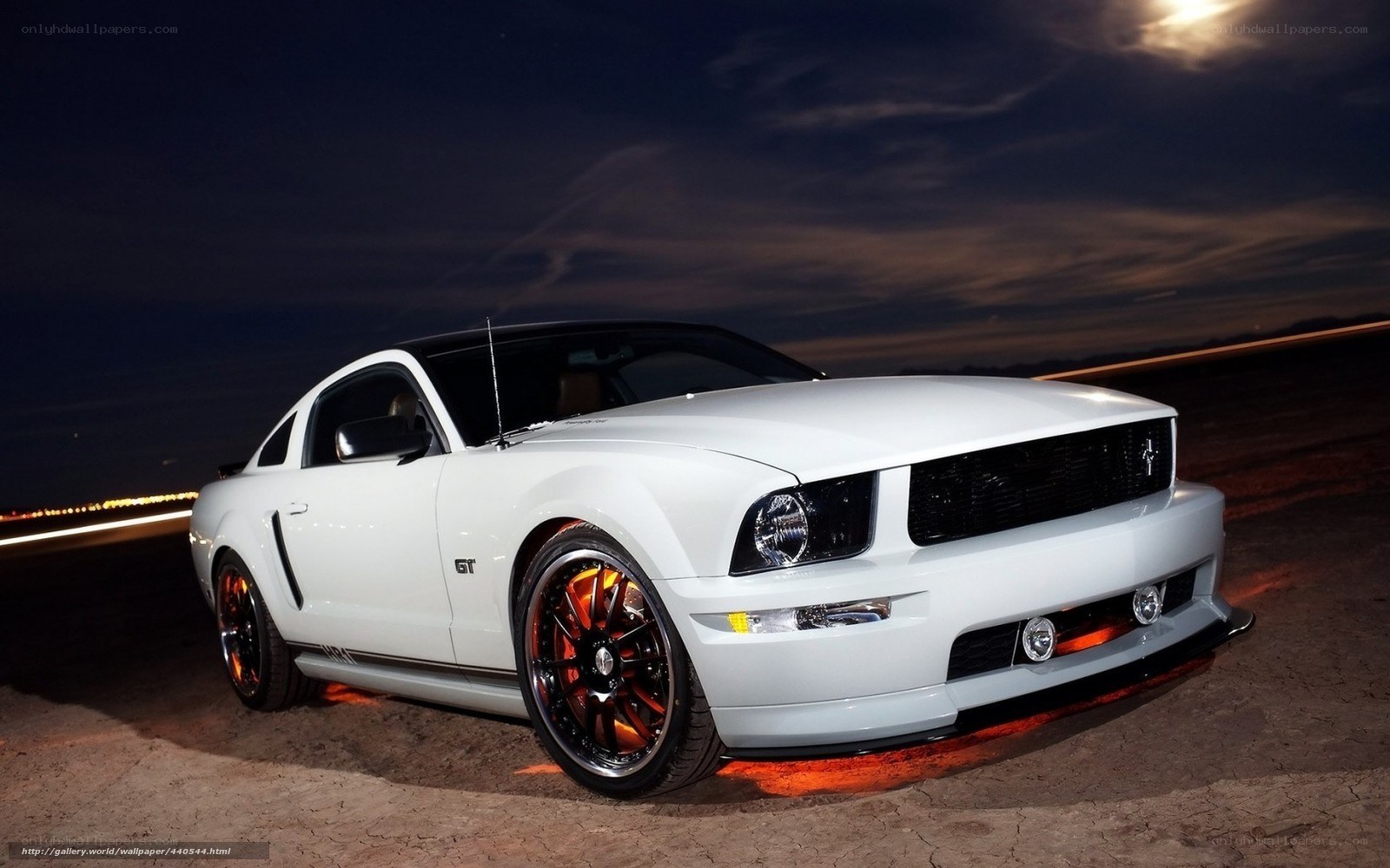 White Ford Mustang GT at night