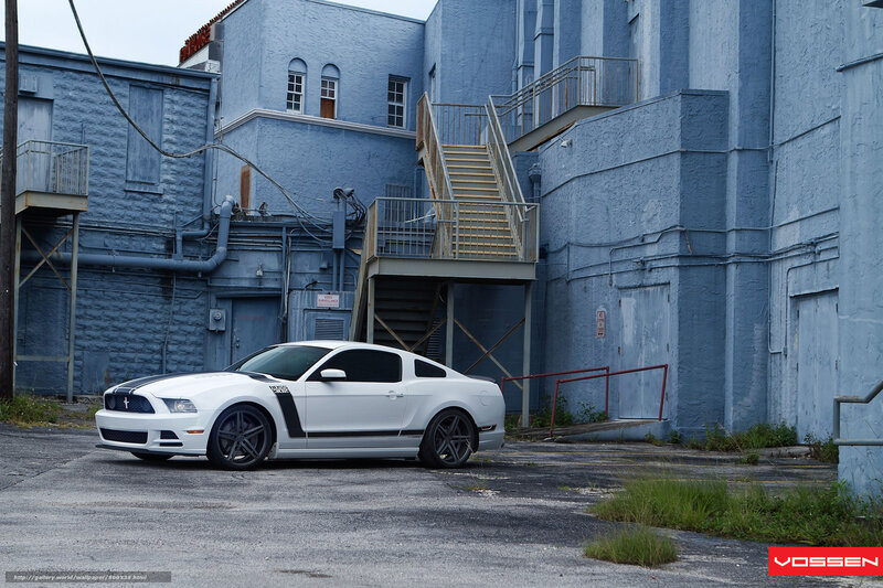 White Ford Mustang in urban setting