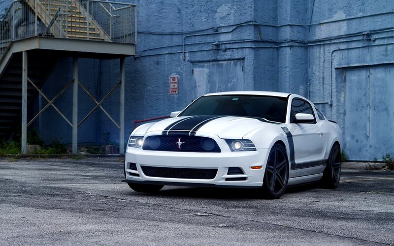white ford mustang on street