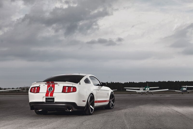 White Ford Mustang on tarmac