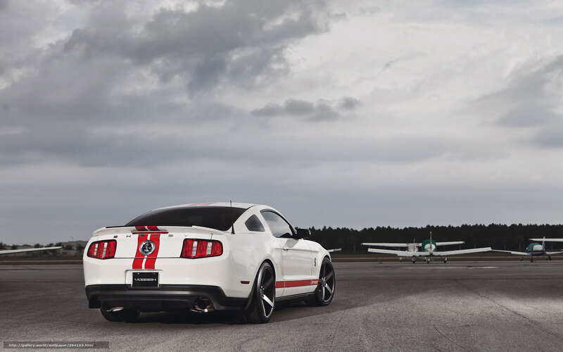 White Ford Mustang on tarmac