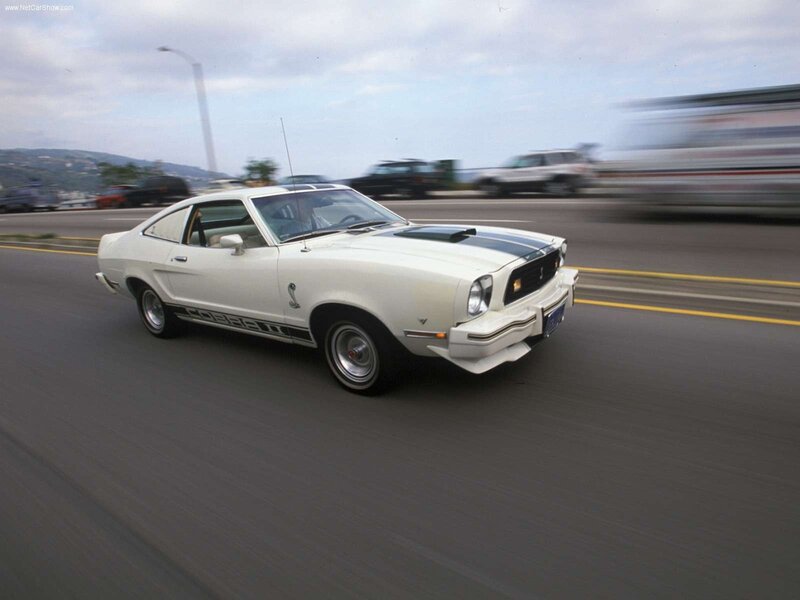 white ford mustang shelby on highway