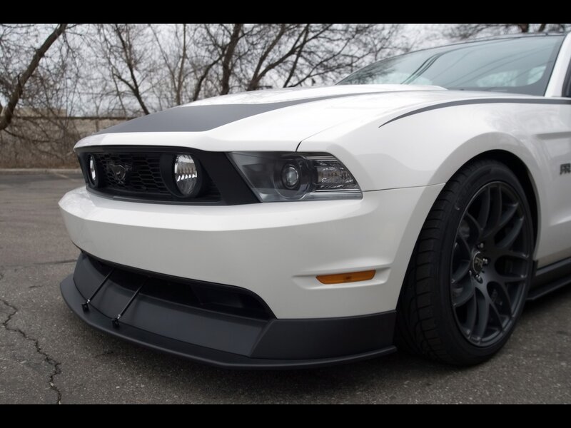 white ford mustang with black accents