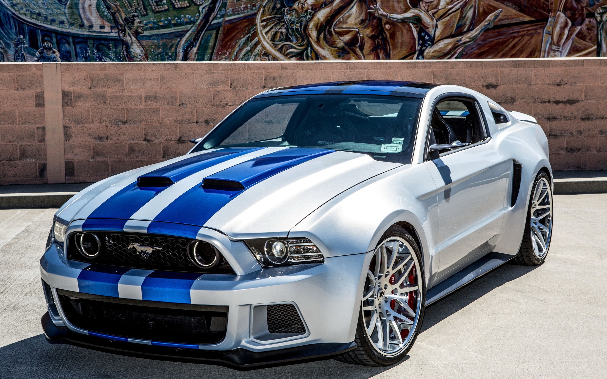 White Ford Mustang with blue stripes