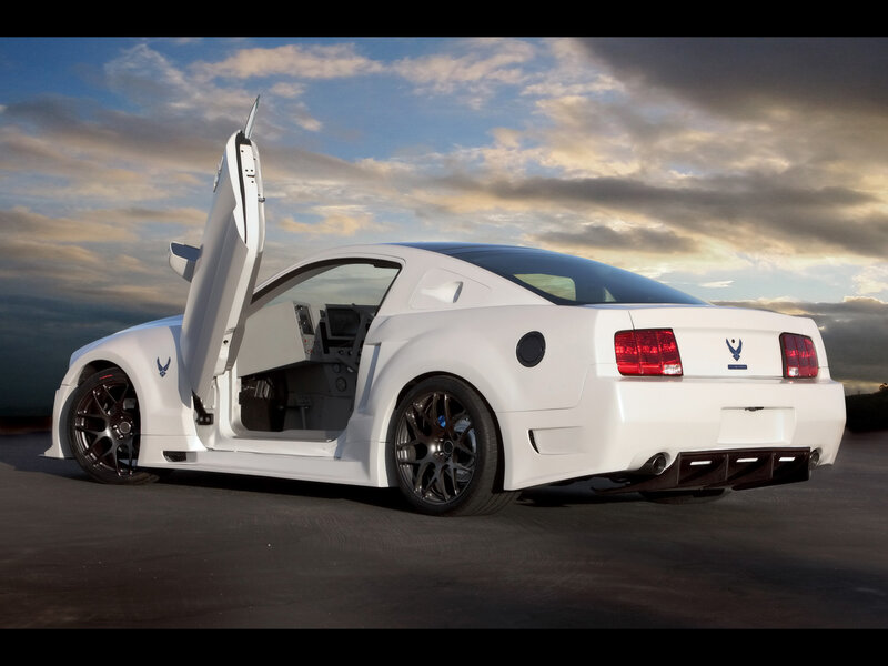 White Ford Mustang with gull-wing door