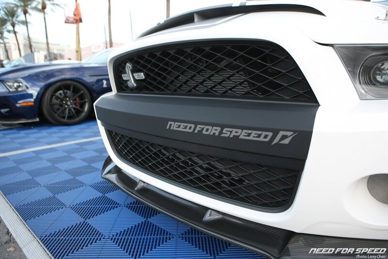 White Ford Mustang with Need for Speed branding