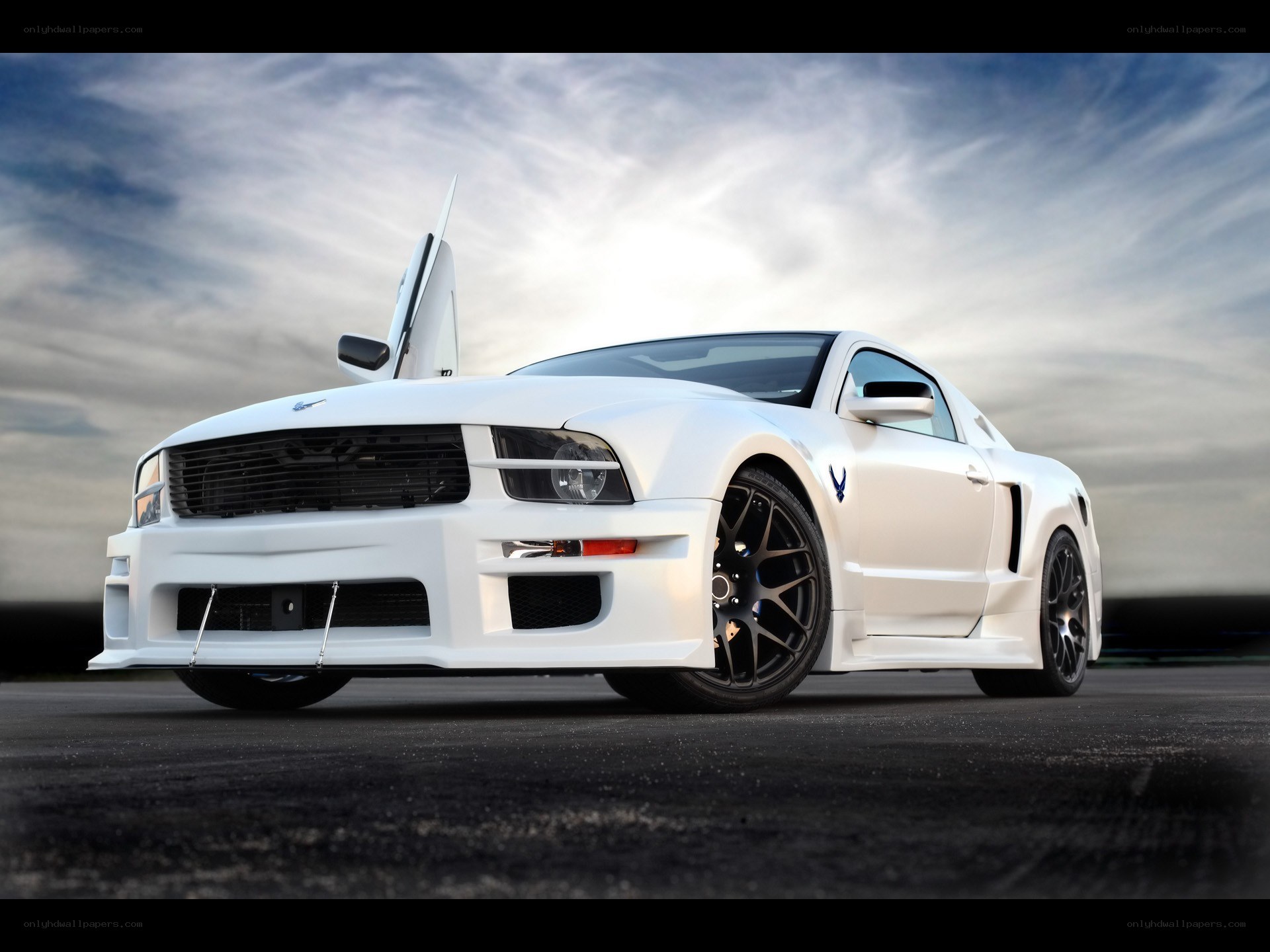 White Ford Mustang with open door