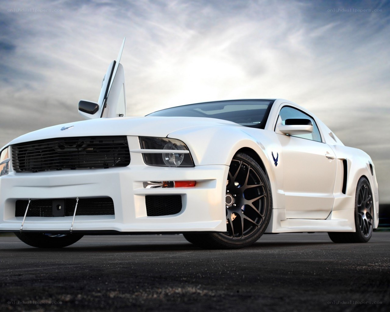 white ford mustang with open door