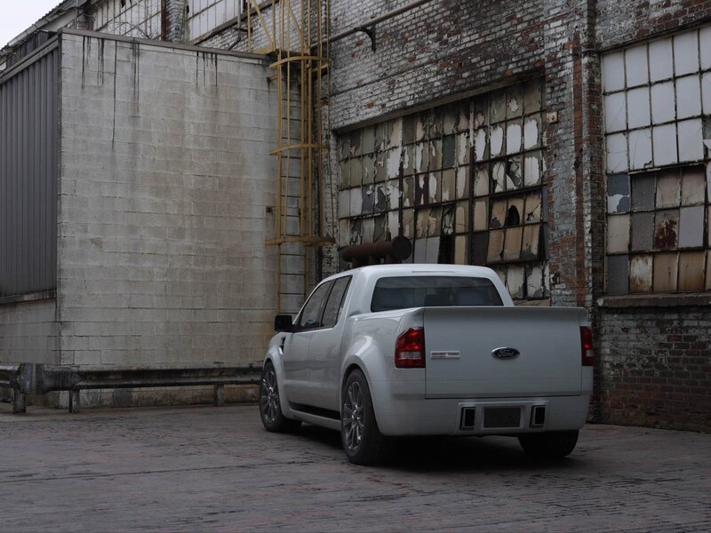 White Ford pickup truck in industrial area