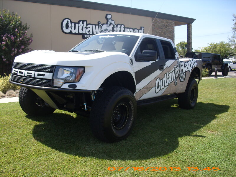 White Ford Raptor Truck