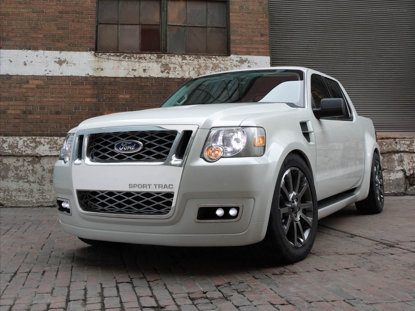 White Ford Sport Trac pickup