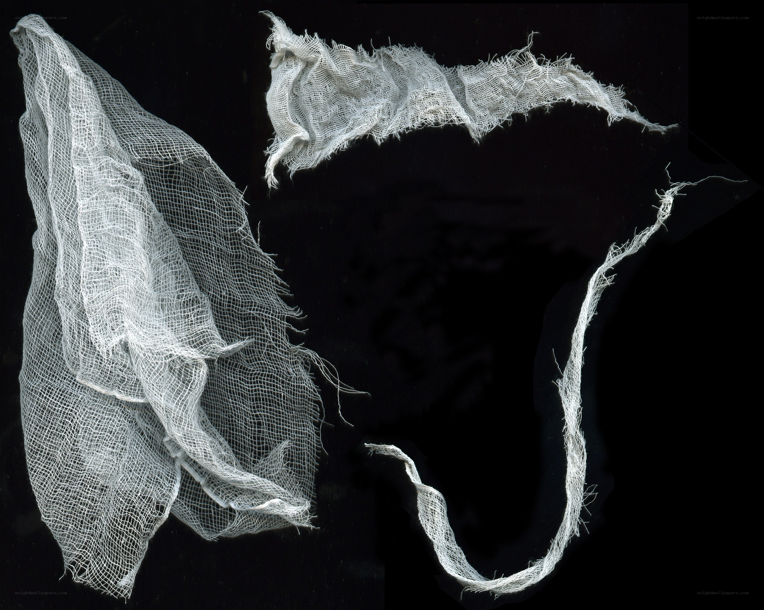 White gauze on black background