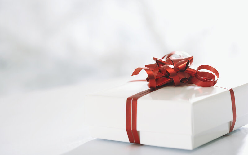 White Gift Box with Red Bow — Calm