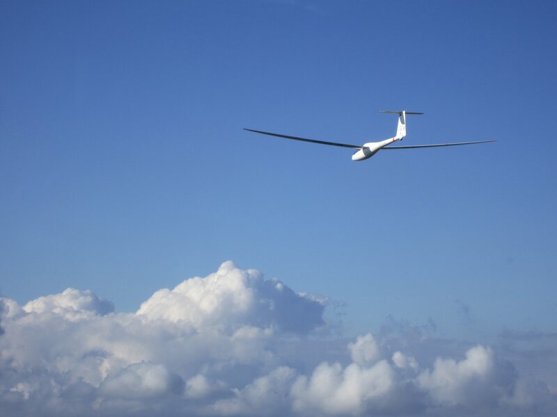 White Glider Aircraft — Blue